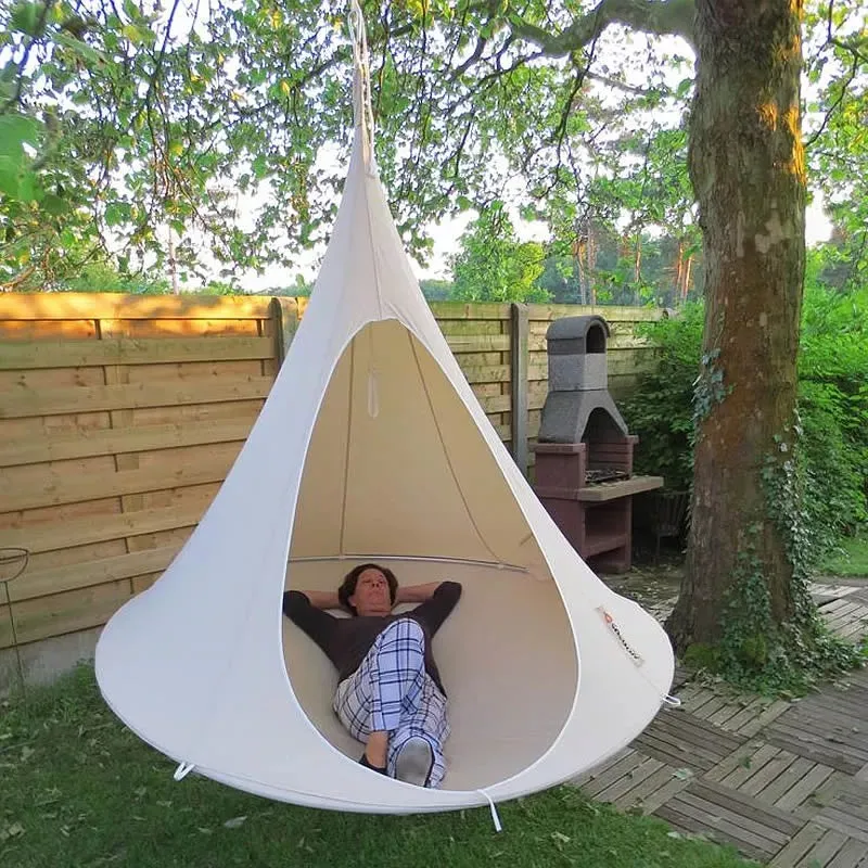 Lightweight portable flying saucer hammock in green oxford cloth with metal frame for camping and outdoor leisure