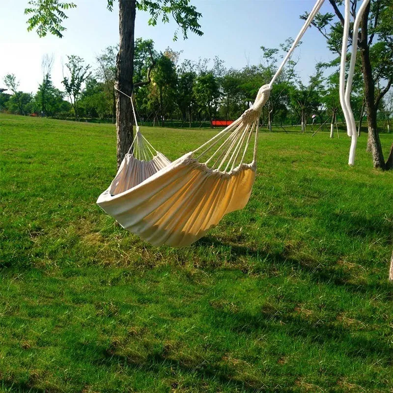 Cotton camping hammock with tree strap for outdoor backpacking and garden relaxation