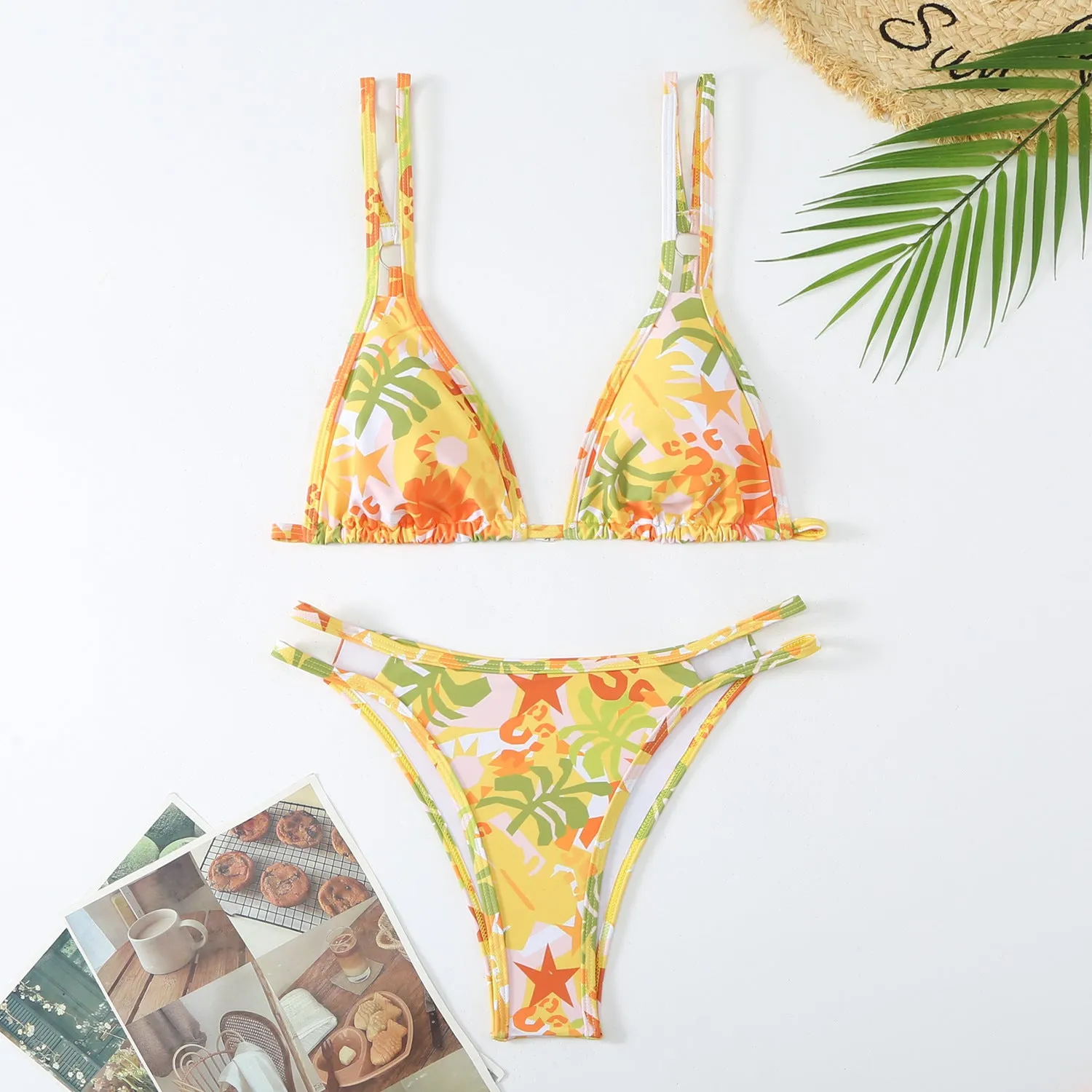 Women's floral printed halterneck bikini set in blue on a mannequin