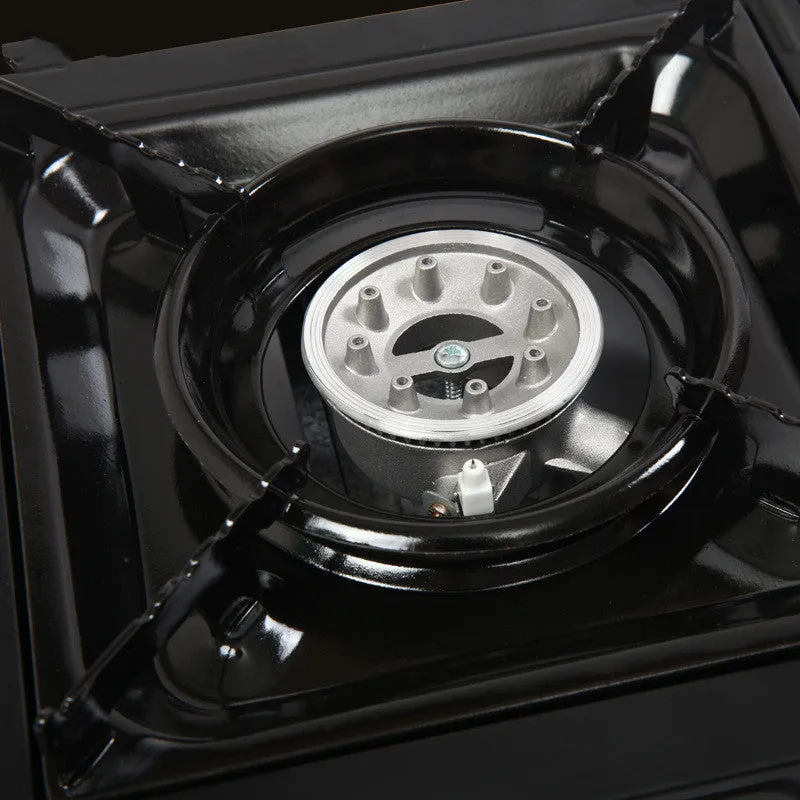 Outdoor windproof portable cassette stove in black plastic case with piezoelectric ignition and safety device