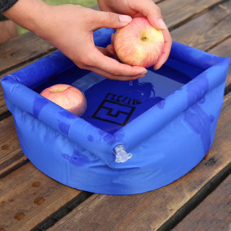 Outdoor folding washbasin bucket, plastic, 30cm diameter, available in blue and green, folded flat view