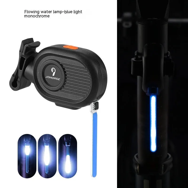 USB rechargeable bicycle tail light with blue waterfall or running water lighting effect on a bike seat post.