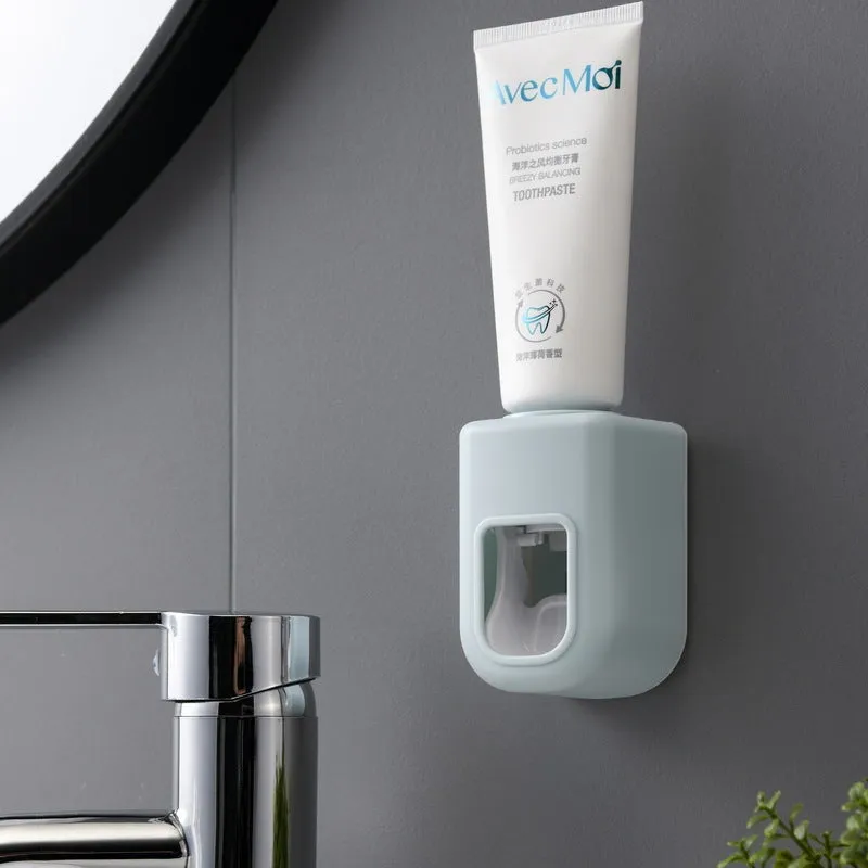 Nordic automatic toothpaste dispenser wall mounted in pink colour with compact 9x6x6cm design