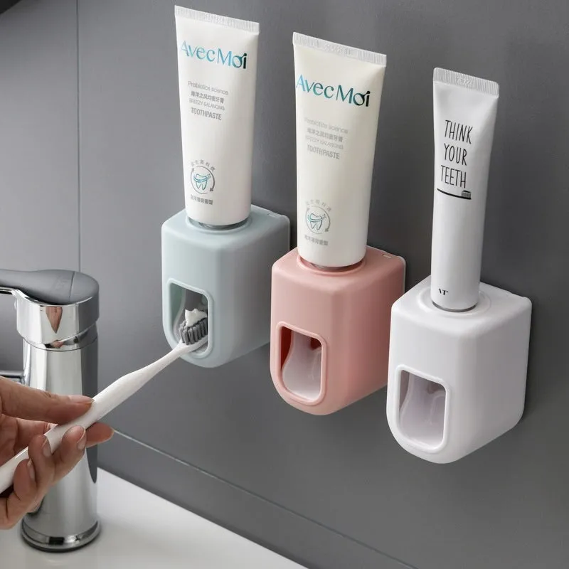 Nordic automatic toothpaste dispenser wall mounted in pink colour with compact 9x6x6cm design