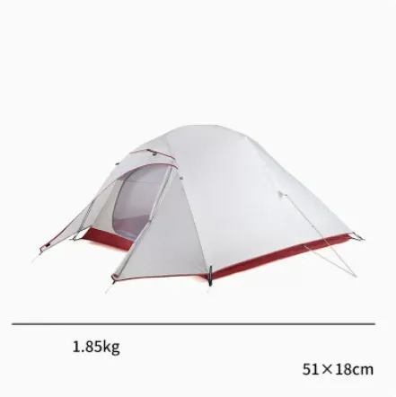 Double layer rain proof camping tent with aluminium alloy poles in sprout green colour set up outdoors