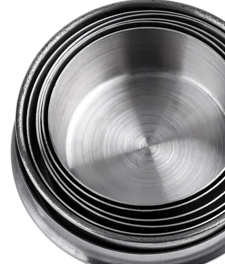 Silver stainless steel collapsible travel cup folded small on a key ring for outdoor use