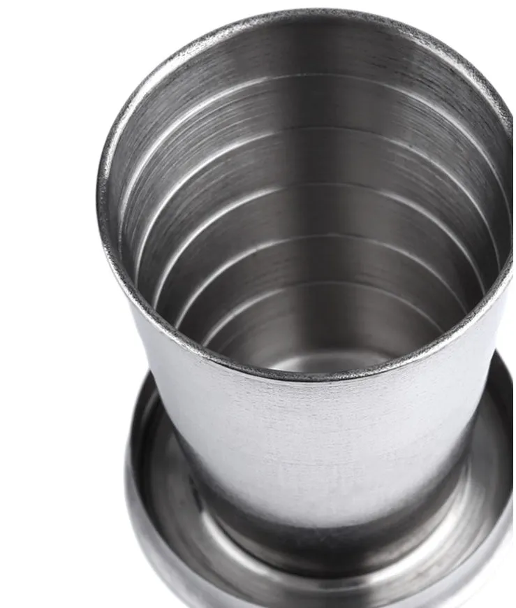 Silver stainless steel collapsible travel cup folded small on a key ring for outdoor use