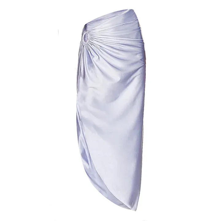 Purple women's one-piece swimsuit with a matching wrap skirt on a model, showing the quick-dry fabric and tight fit.