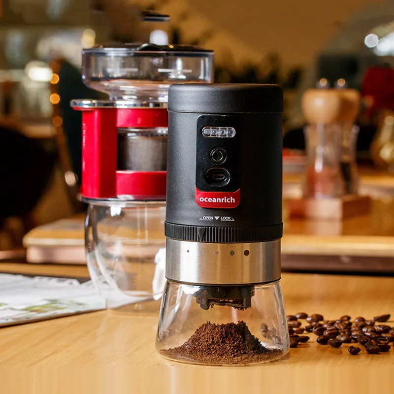 Portable black hand crank coffee grinder with manual operation for travel and home use