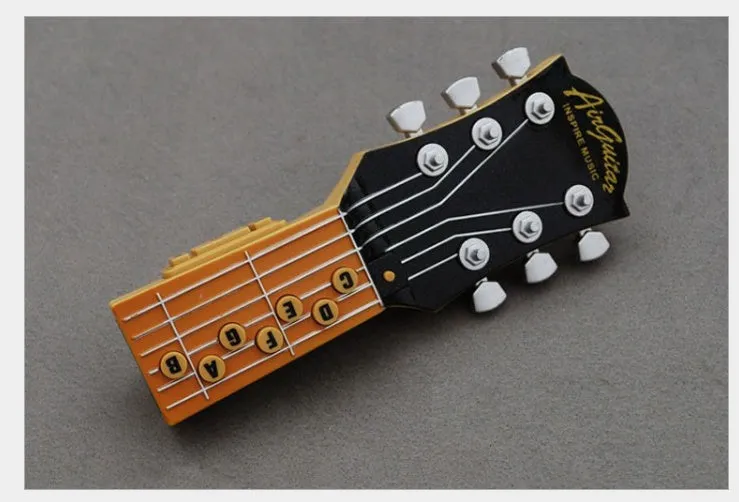 Infrared air guitar with seven chord buttons and tilt sensor in red, 21cm long