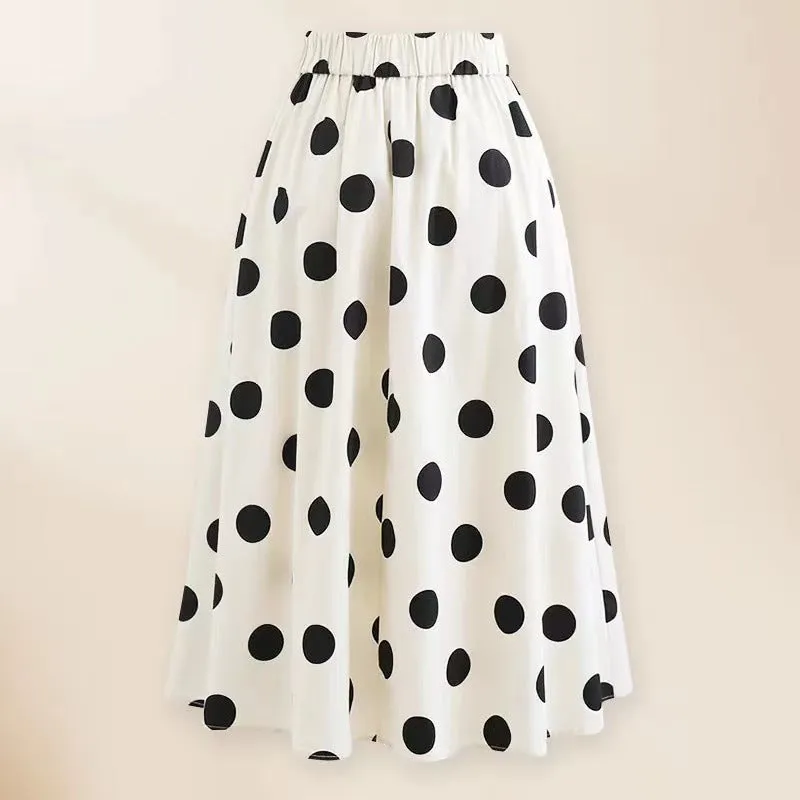 Women's one-piece swimsuit with beach dress style skirt and bow detail in polyester fabric