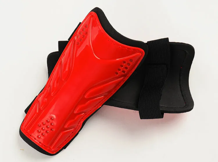 Football leggings with single bandage leg guard in black, showing outer plastic plating and soft foam inner