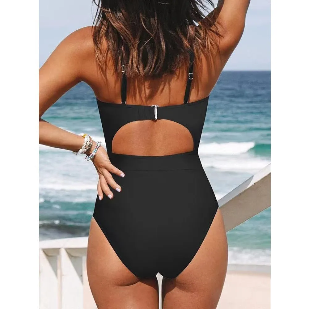 Woman wearing a solid colour cross-back halter one-piece swimsuit on the beach.