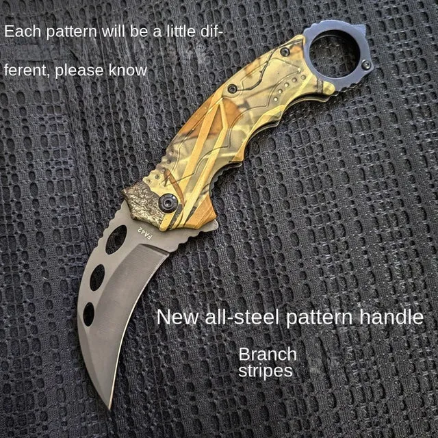 Folding claw knife with grey titanium blade and sour branch wood handle on a surface