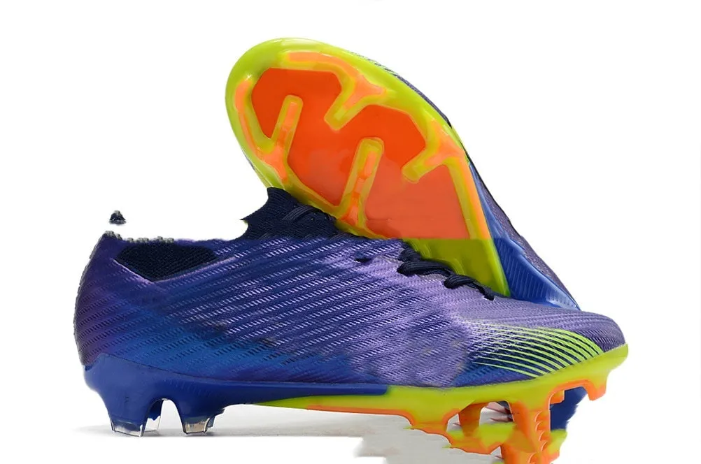 Men's low-top football boots with knitted upper, FG studs, and a lace-up front.