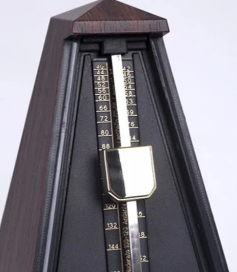 Mechanical tower metronome with imitation wood grain finish, PPS plastic body, 800g weight