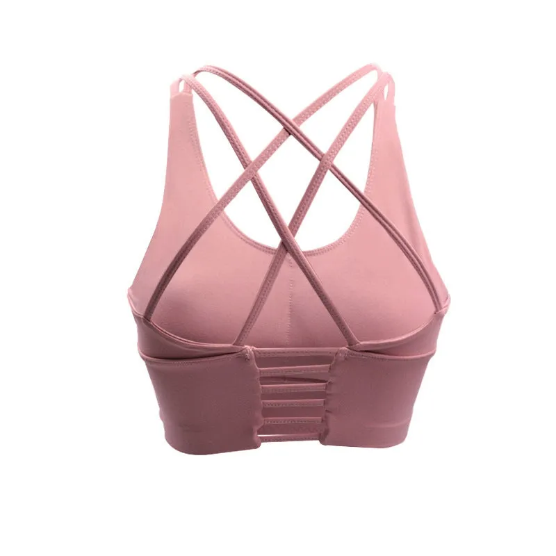 Black nylon vest-style fitness bra with spandex lining on a white background