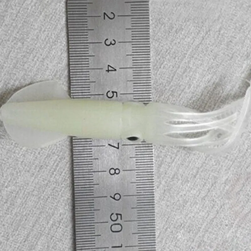 Pack of 10 luminous squid baits in light green, 105mm long, soft plastic bionic shape
