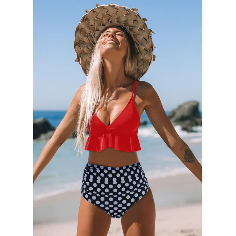 Ruffled nylon swimsuit with steel support and floral lotus print in red, showing ruffled neckline and built-in pads