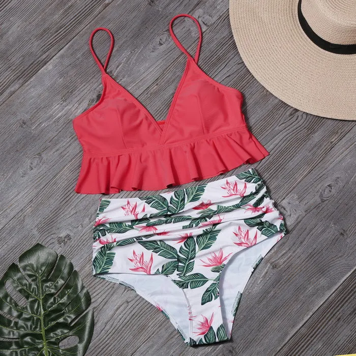 Ruffled nylon swimsuit with steel support and floral lotus print in red, showing ruffled neckline and built-in pads