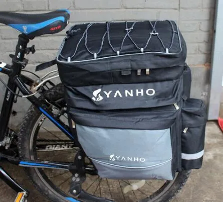 Black mountain bike bag with rain cover on rear rack, 43 litre capacity, 600D nylon