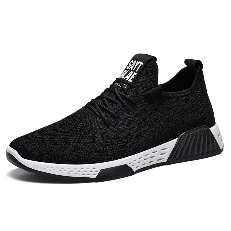 Casual running shoes with mesh upper and plastic sole in black colour style