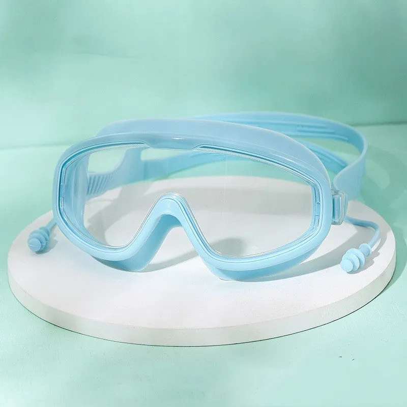 Large frame anti-fog swimming goggles in transparent blue for adults