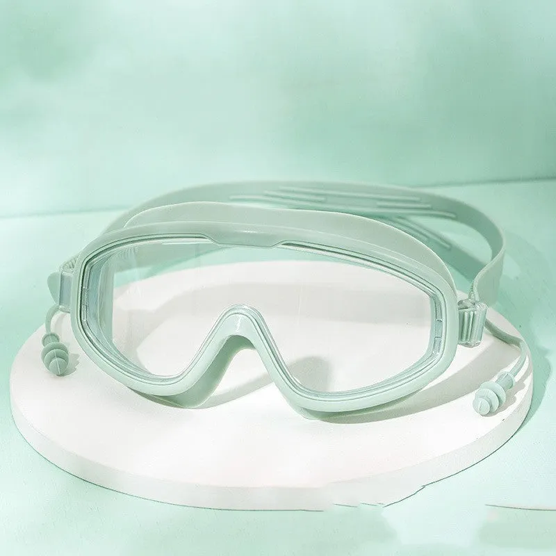 Large frame anti-fog swimming goggles in transparent blue for adults