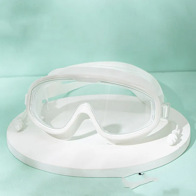 Large frame anti-fog swimming goggles in transparent blue for adults