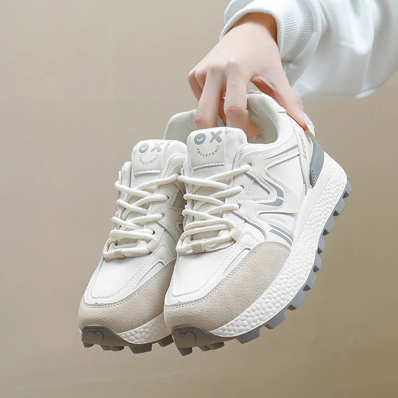 Women's solid colour platform casual shoes with lace-up front and round toe in black, grey, or khaki.