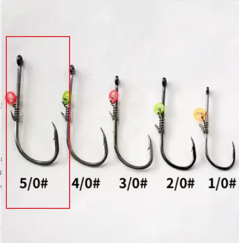 Spring rubber band sea fishing lure with barbed hook holding live shrimp for outdoor fishing