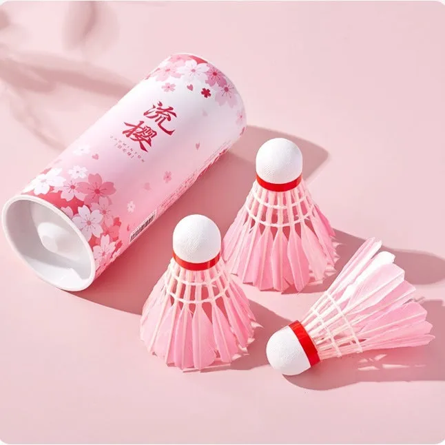 Pink goose feather badminton shuttlecocks in 6 pack on court background