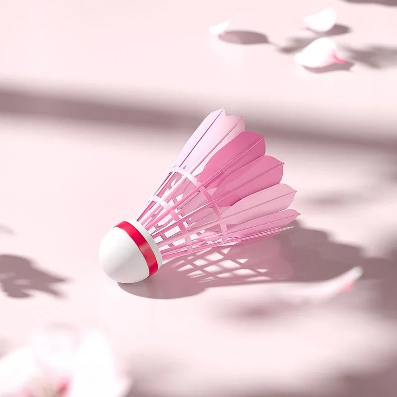 Pink goose feather badminton shuttlecocks in 6 pack on court background