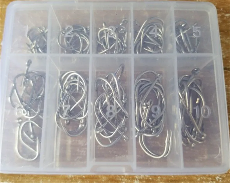 Box of 500 mixed size Iseni style fishing hooks in silver, black, and imitation gold finishes