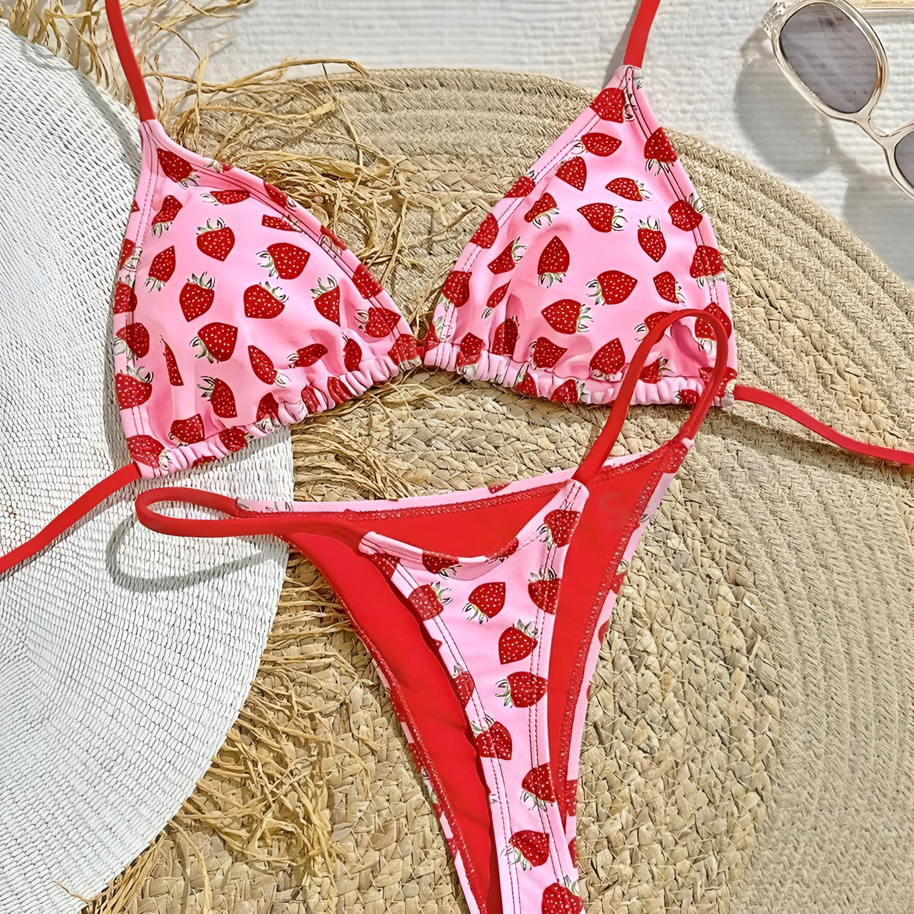 Women's pink strawberry print lace-up triangle bikini set with polyester-nylon fabric for swimming