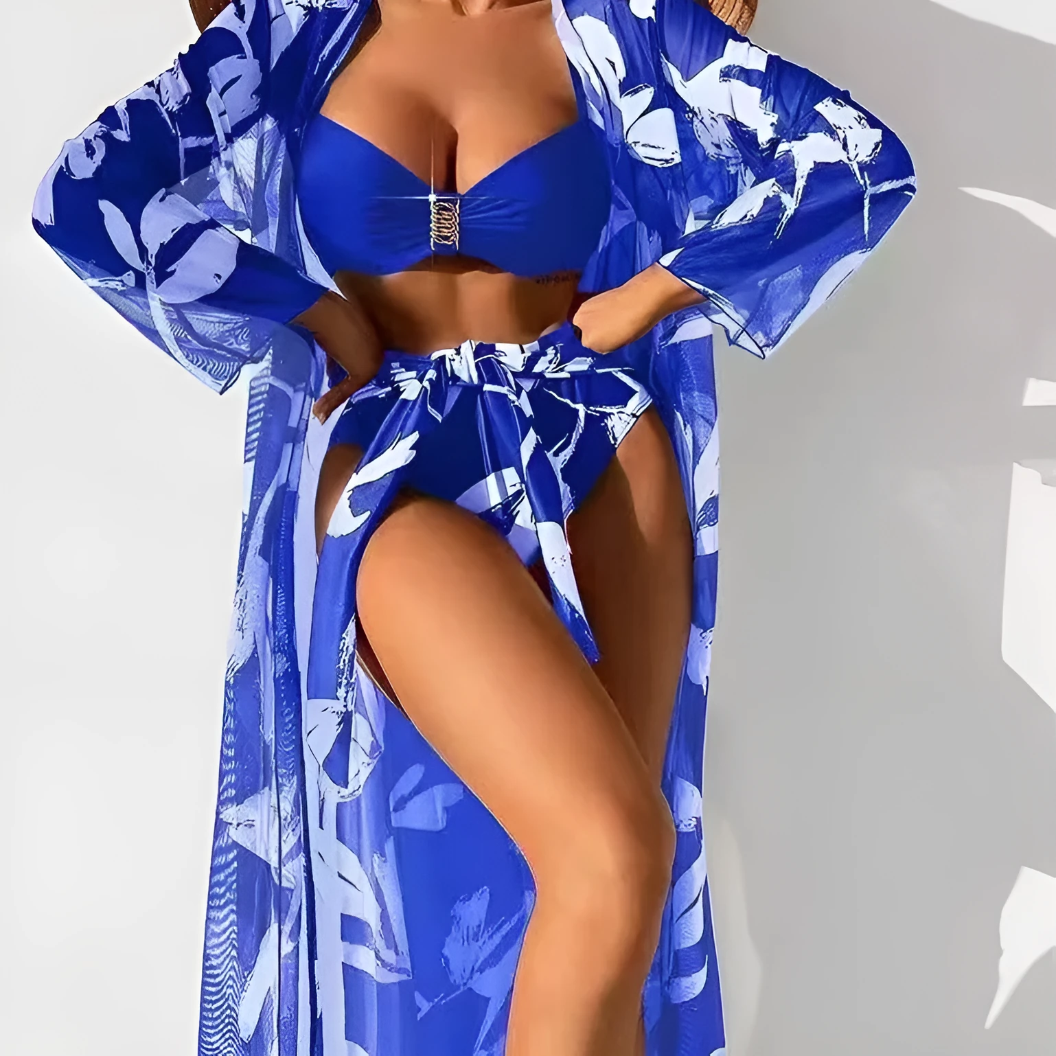 Three-piece women's high-waist swimsuit set with printed pattern, including long shirt cover-up, in black colour option.