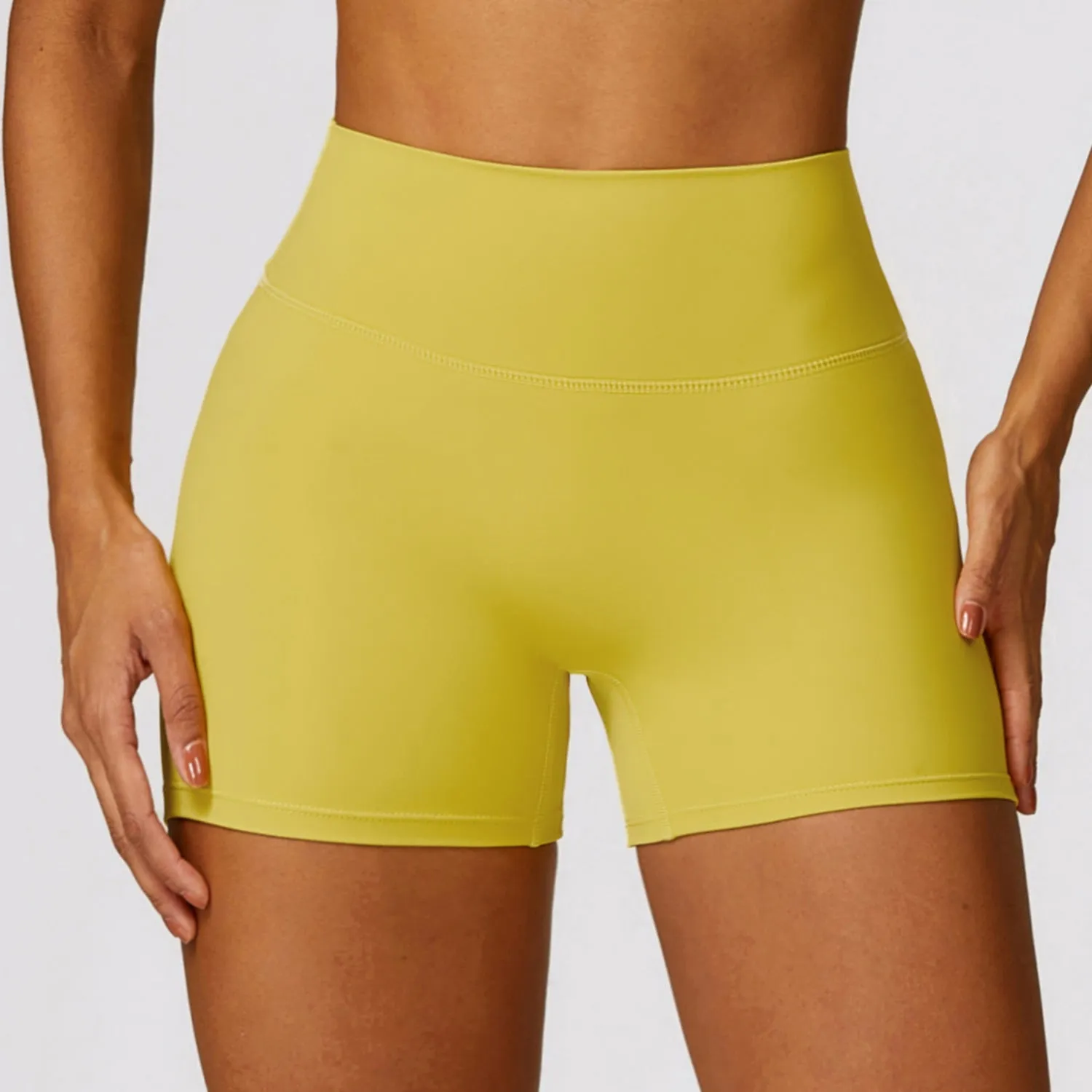 Women's high waist yoga shorts in nylon fabric with belly support design
