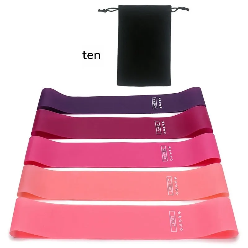 Five colour-coded TPE yoga tension straps with force marks arranged by thickness from 0.5mm to 1.1mm