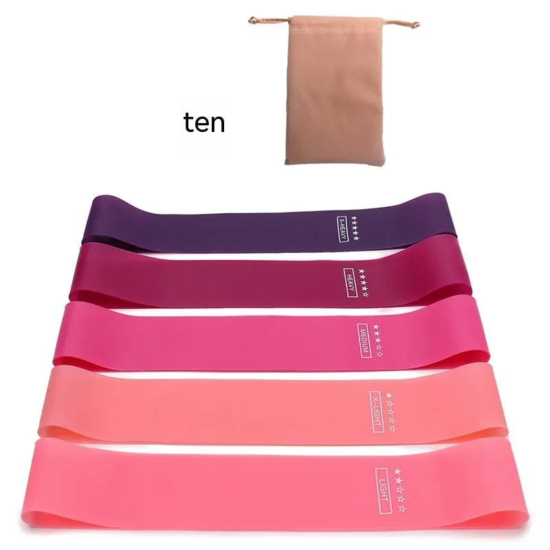 Five colour-coded TPE yoga tension straps with force marks arranged by thickness from 0.5mm to 1.1mm