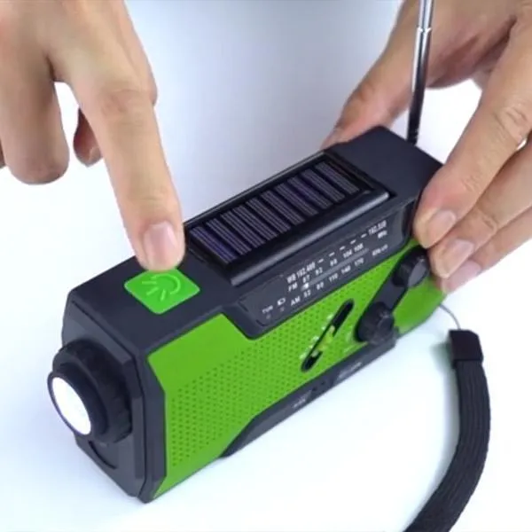 Pocket solar radio in green, waterproof and solar-powered for outdoor use