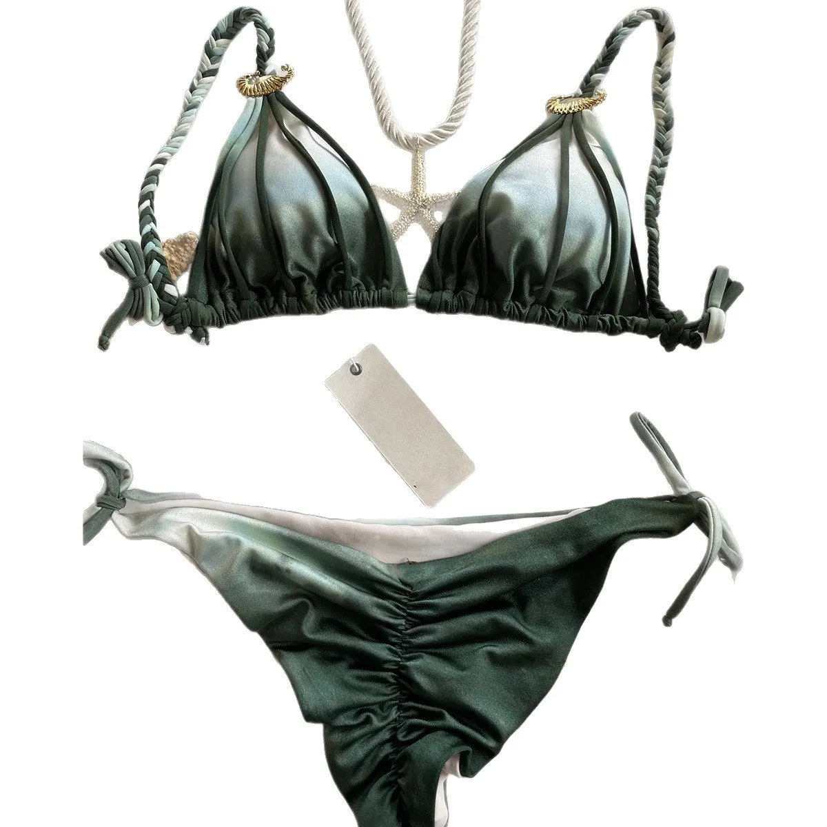 Tie-dyed bikini set in green with high-waist backless briefs on a woman by the seaside