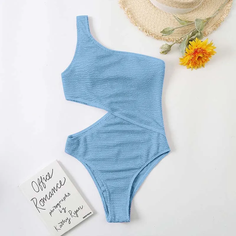 Solid colour women's one piece one shoulder swimsuit in polyester, available in multiple colours