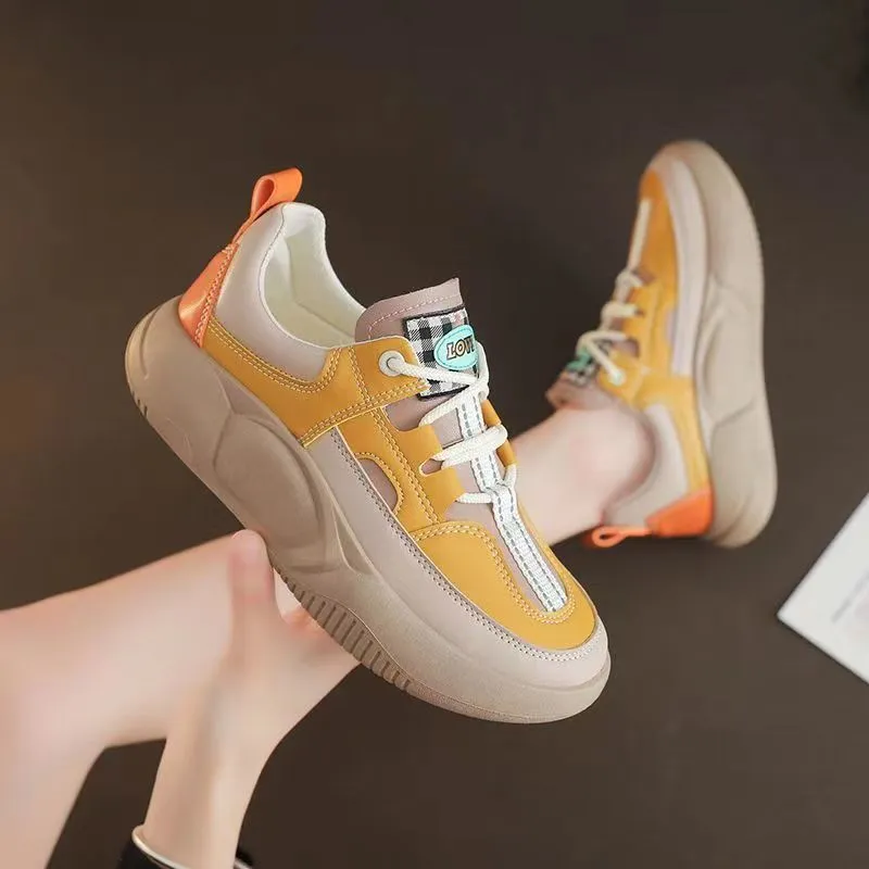 Women's beige thick-soled stitching sneakers with round toe and front lacing on flat heel
