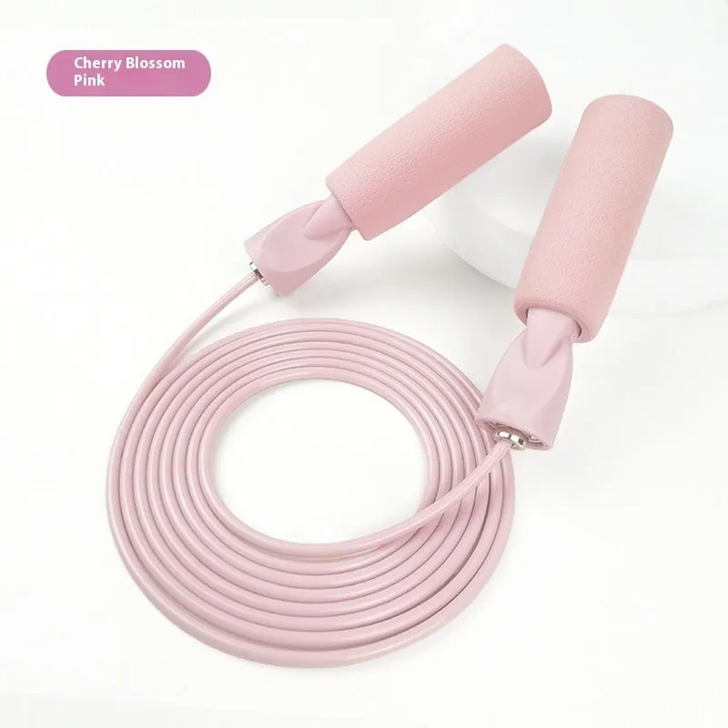 PVC bearing wire rope fitness skipping rope in peacock blue with handles on a plain background