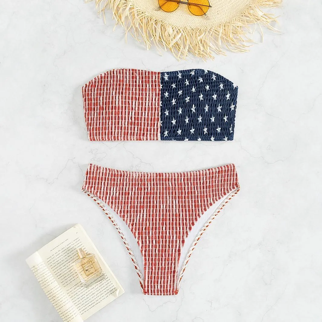 Women's red and blue high elasticity polyester bikini set on a beach background