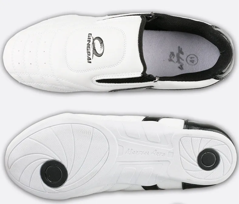 Black and white children's Sanda Taekwondo martial arts shoes with a soft sole and widened fit.