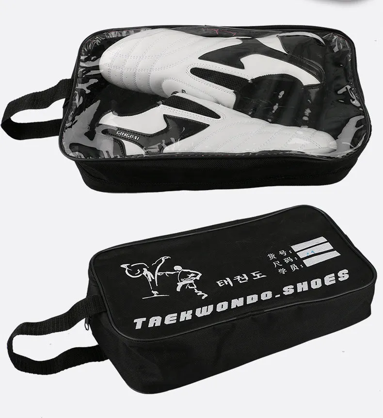 Black and white children's Sanda Taekwondo martial arts shoes with a soft sole and widened fit.