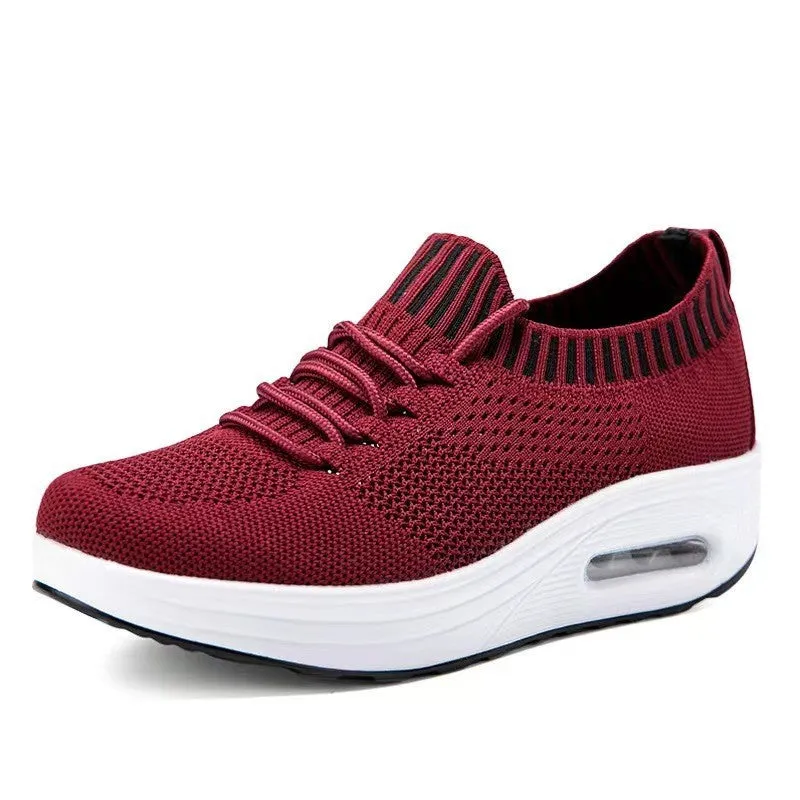 Women's mesh low-top air cushion thick sole breathable shoes in white with rubber soles showing side view