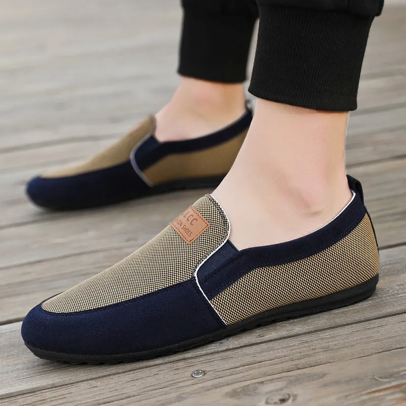 Men's grey and khaki canvas board shoes with round toe and rubber sole.