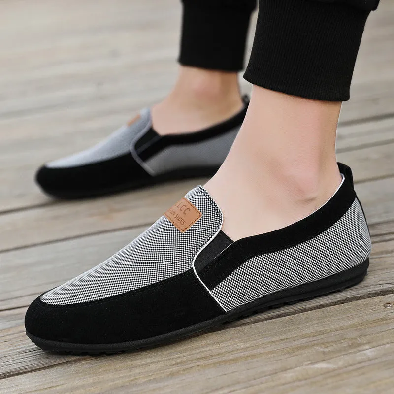 Men's grey and khaki canvas board shoes with round toe and rubber sole.